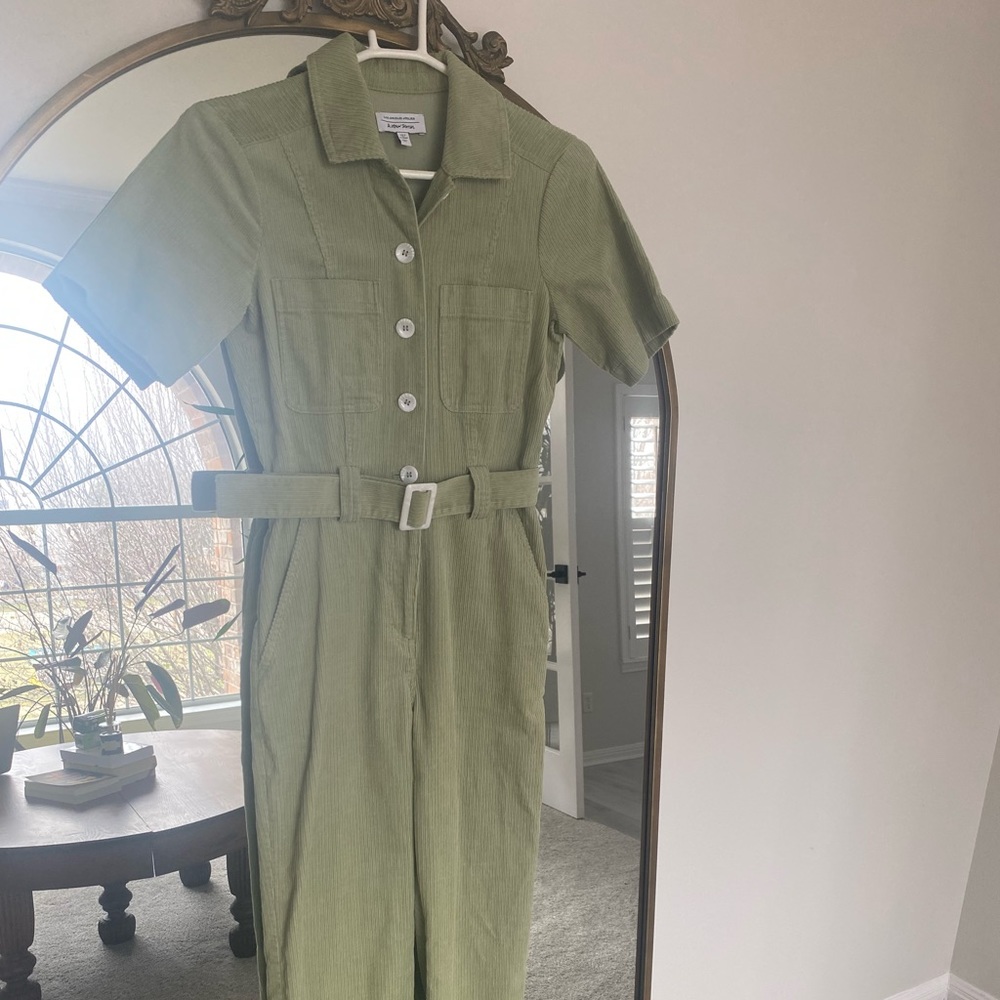 Light green jumpsuit with pockets (front and back)